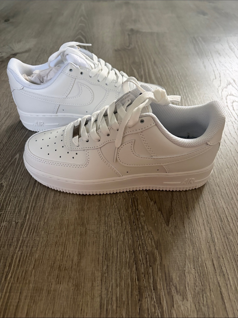 Air Force 1’s Men’s White Low-Top Sneakers